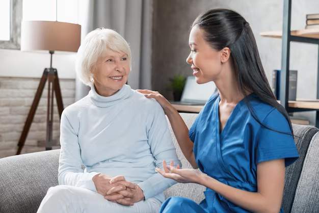 Healthcare professional supporting a patient in a clinical setting